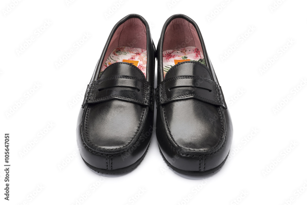 girls black school shoe on a white background