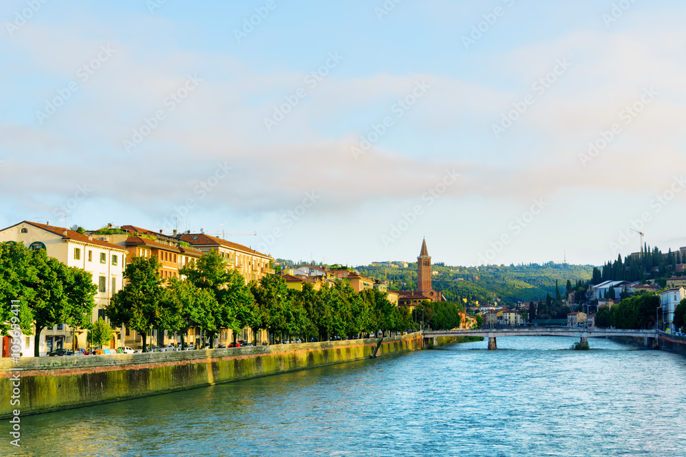 View of the Adige River and the Ponte Nuovo in Verona, Italy