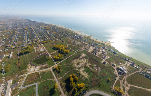 Aerial view of a summer house village at blue sea coast. photo