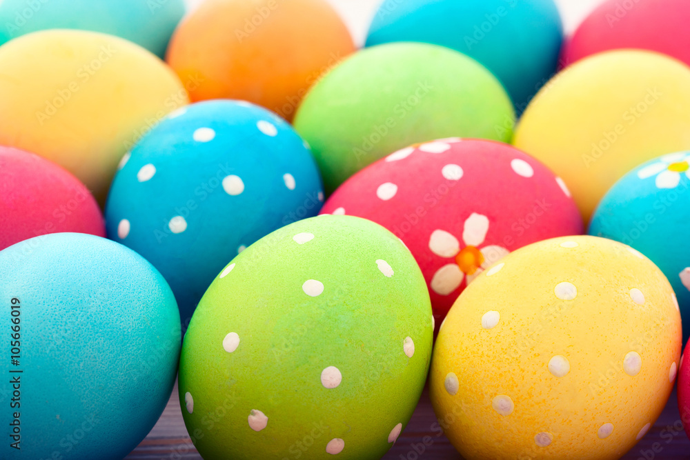 Easter background. Colorful easter eggs with pattern flowers. Top view, horizontal. Poster, mock up for design. Selective focus