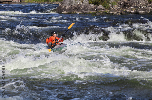 Kayaker in whitewater