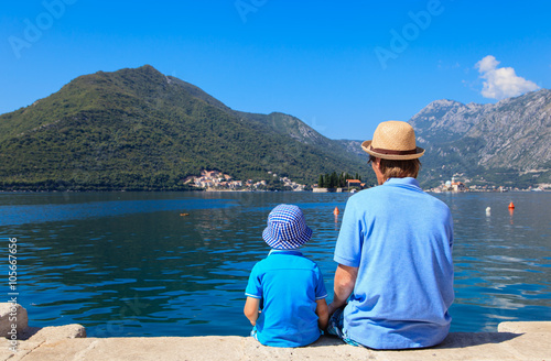father and son looking at scenic view in Montenegro