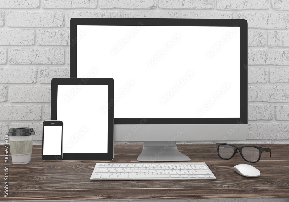 Responsive mockup screen. Monitor, tablet, phone on table in office. Responsive mockup screen. Monitor, tablet, phone on table in office.