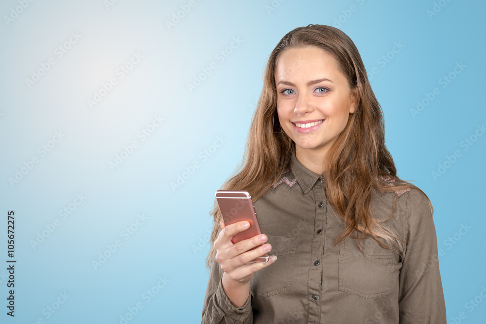 Close up portrait of a young fashionable woman holding a smartphone Close up portrait of a young fashionable woman holding a smartphone