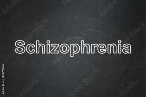 Healthcare concept: Schizophrenia on chalkboard background