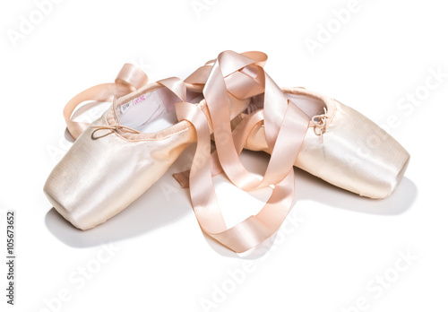 Pink ballet shoes isolated