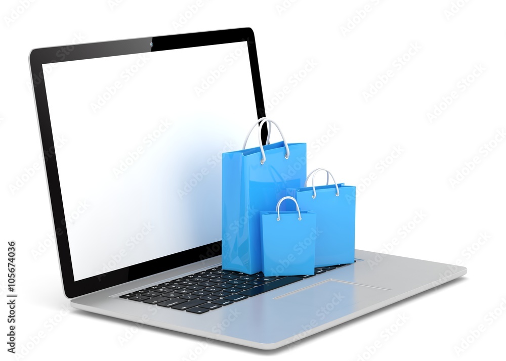 laptop and shopping pags on white background laptop and shopping pags on white background