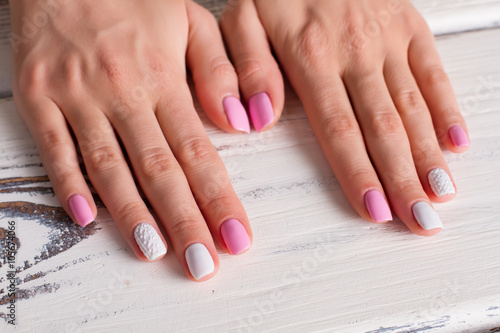 White-pink manicure.
