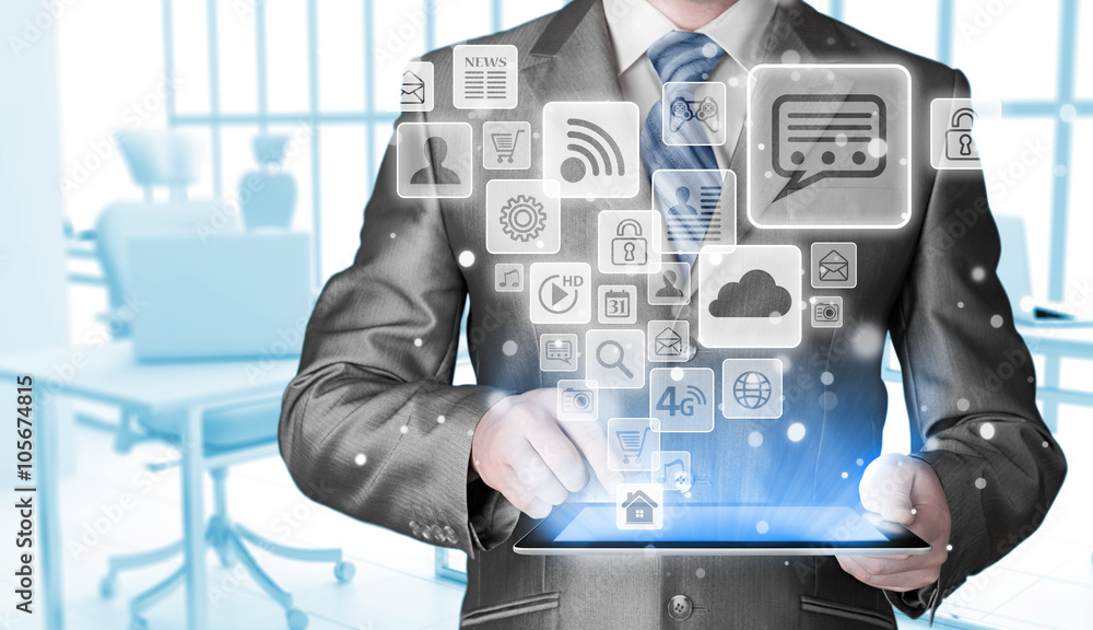 Business man using tablet PC with social media icon set Business man using tablet PC with social media icon set