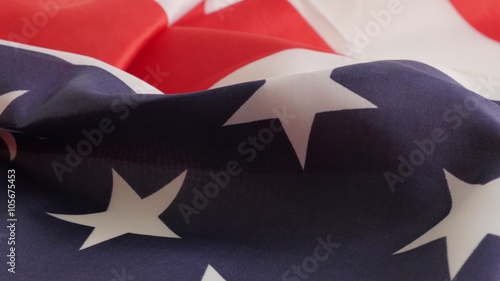 USA national flag stars and stripes fabric slow tilt 4K 2160p UltraHD footage - Slow tilting over Unaited States of America flag fabric 4K 3840X2160 UHD video  photo