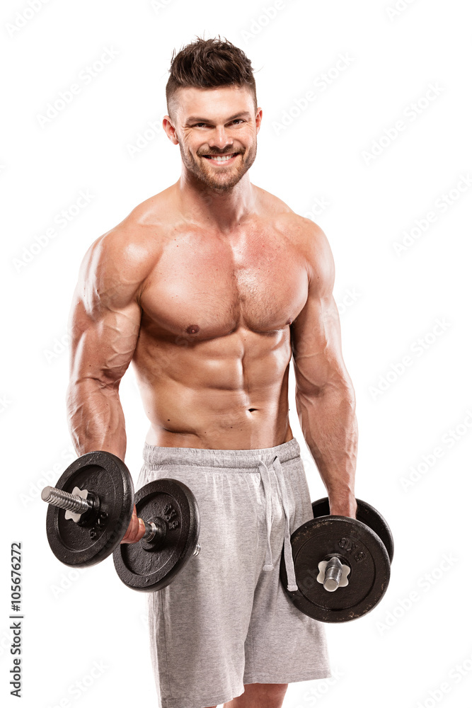 Muscular bodybuilder guy doing exercises with big dumbbell Muscular bodybuilder guy doing exercises with big dumbbell