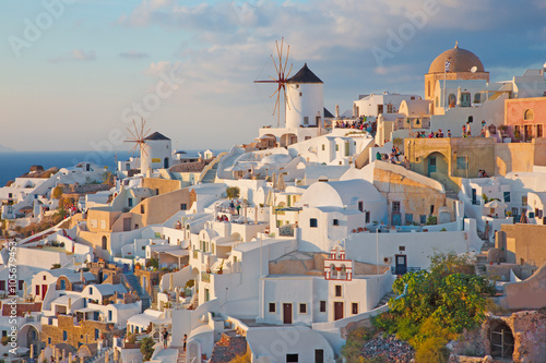 Santorini - The look to part of Oia with the windmills in evening light.