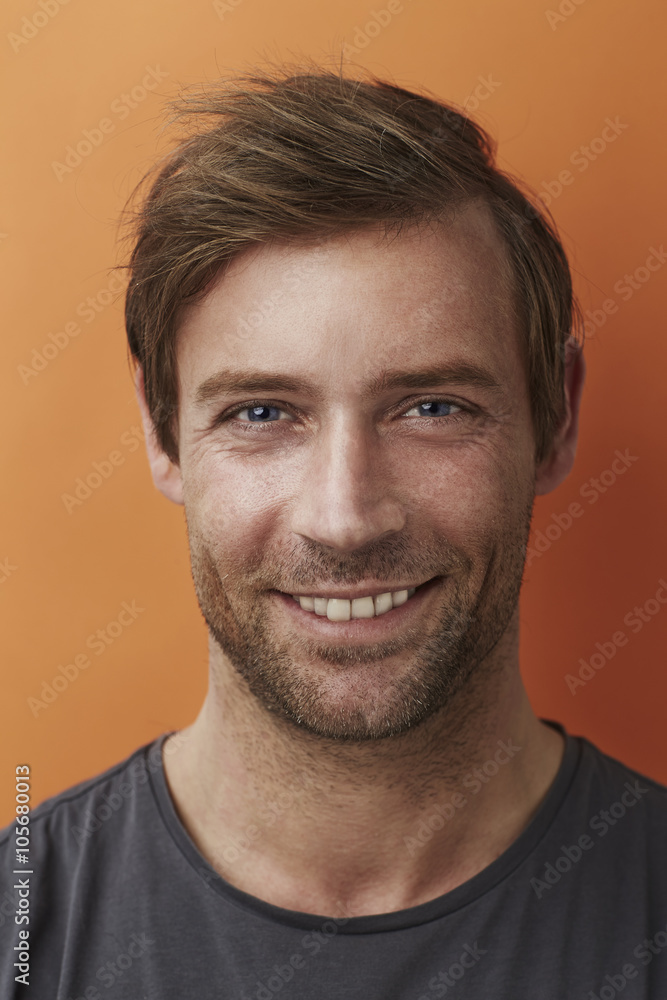 Fototapeta premium Handsome man smiling at camera