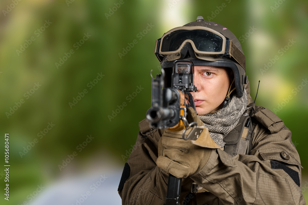 Soldier aiming a rifle at you