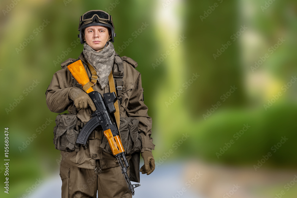 Soldier with rifle and mask