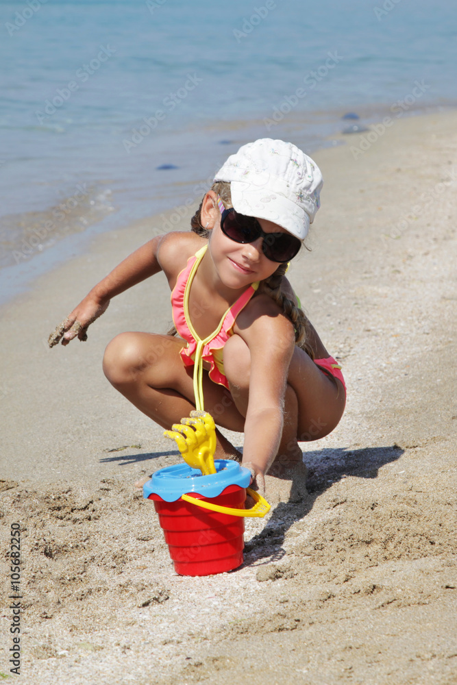 Portrait little girl on sandy beach Portrait little girl on sandy beach