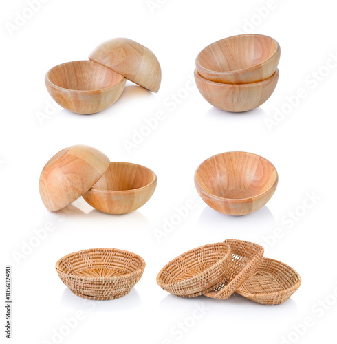 wooden bowl and wicker basket on white background