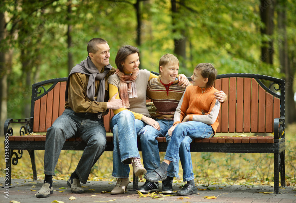 Family of four sitting Family of four sitting
