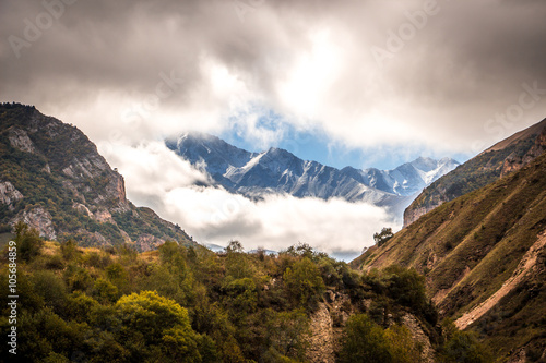  Beautiful mountain landscape, the mountains appearing in the clouds. The Caucasus.
