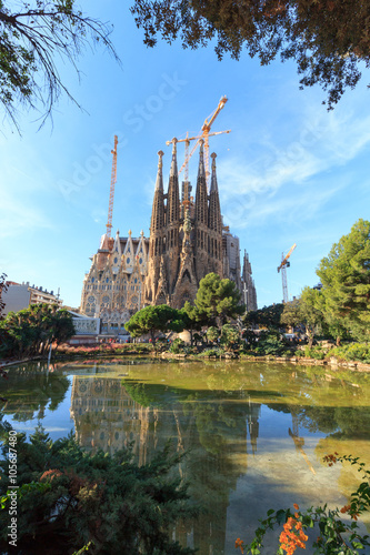 Basilica church Sagrada Familia seen from Placa de Gaudi in Barcelona, Spain