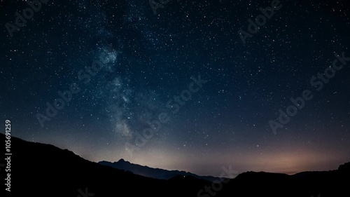 Wallpaper Mural timelapse night sky stars milky way on mountains background. 4K. Tuscany  Torontodigital.ca