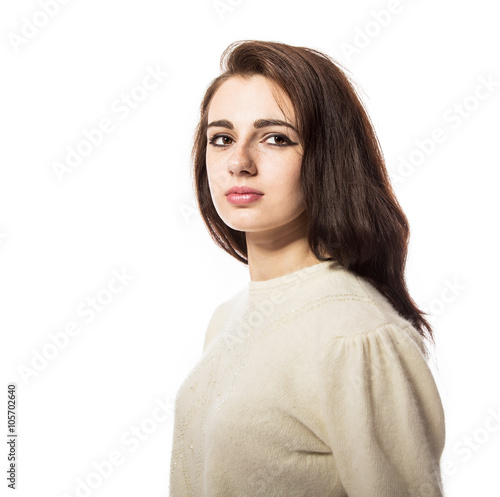 Portrait of young beautiful model with freckles.