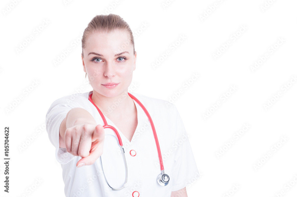Closeup portrait of beautiful woman doctor pointing at you Closeup portrait of beautiful woman doctor pointing at you
