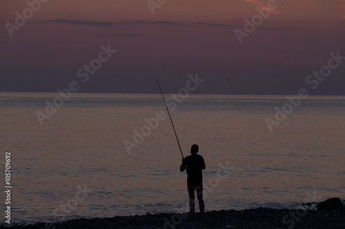 рыбак,закат,море