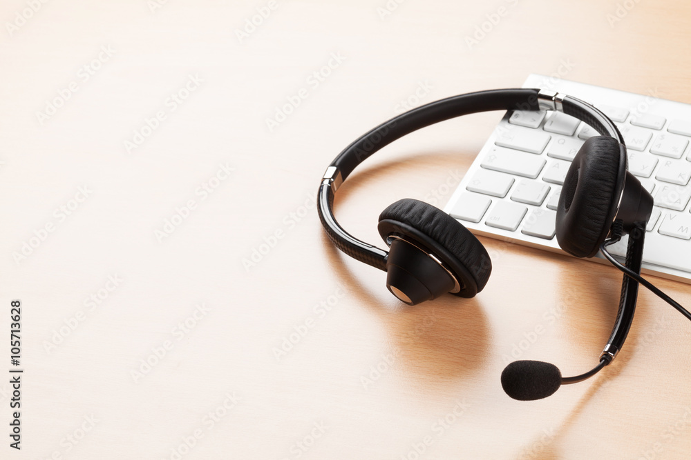 Office desk with headset. Call center support Office desk with headset. Call center support