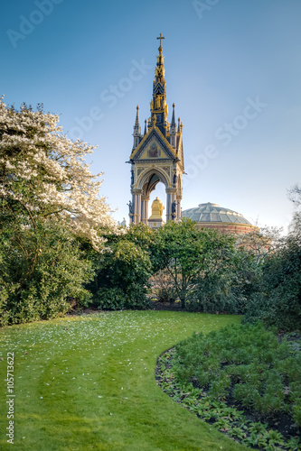 Prince albert memorial seen from Kensington garden on a spring day with the cherry trees blossoming