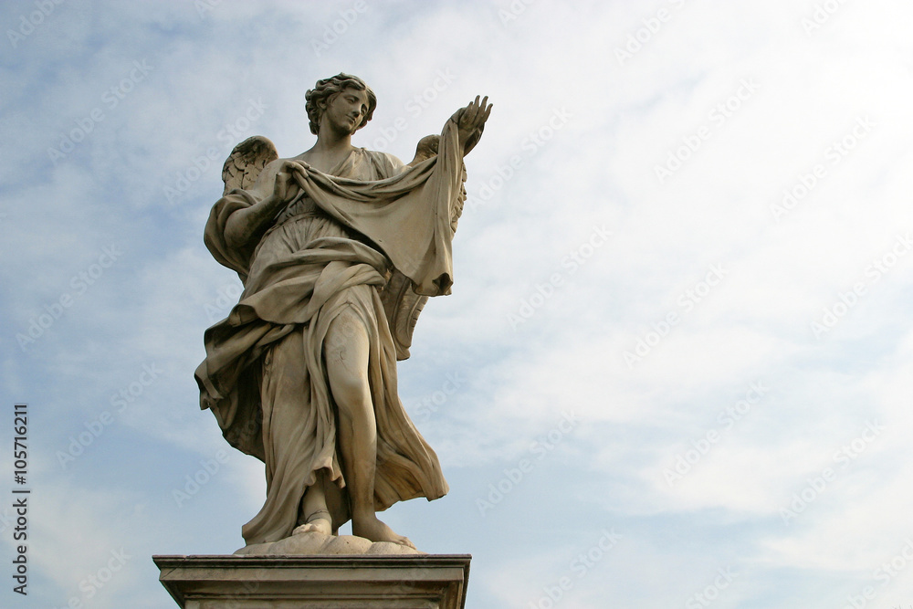 Bernini's angel along the Holy Angel bridge near the Hadrian Mausoleum in Rome, Italy 
