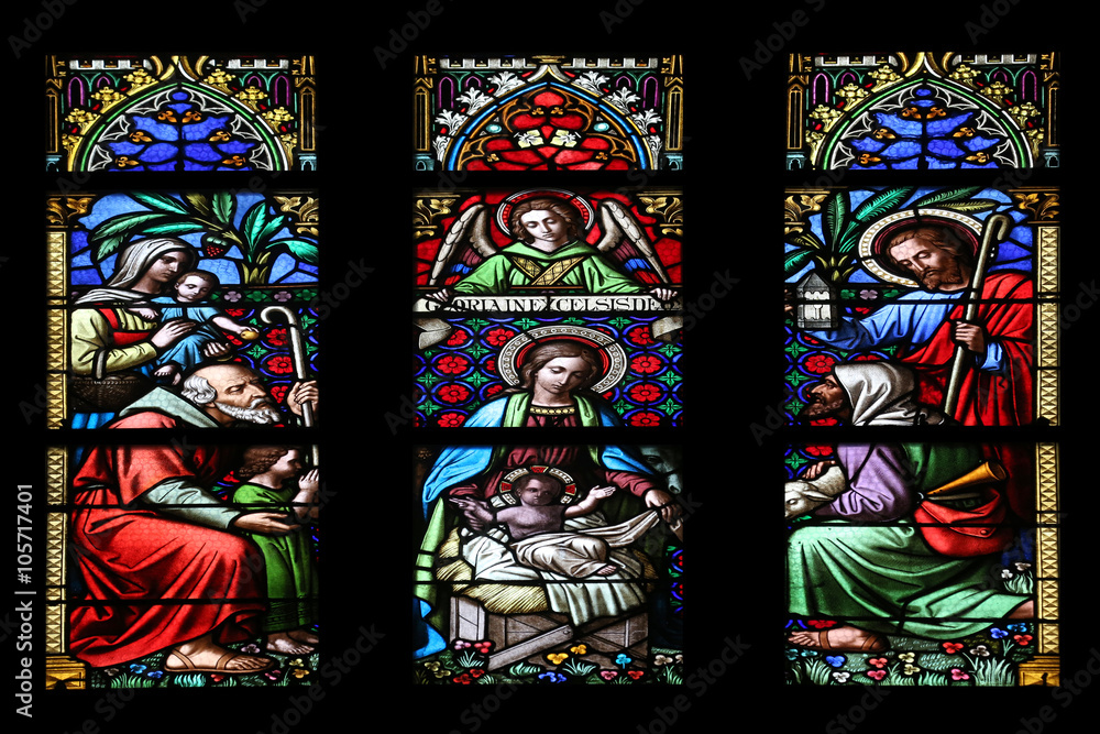 Nativity Scene, Adoration of the Shepherds, stained glass window in parish church of Saint Mark in Zagreb, Croatia 