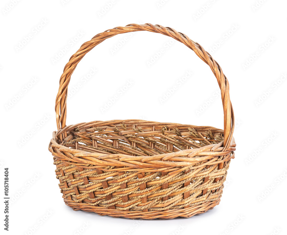 Brown wicker basket on white