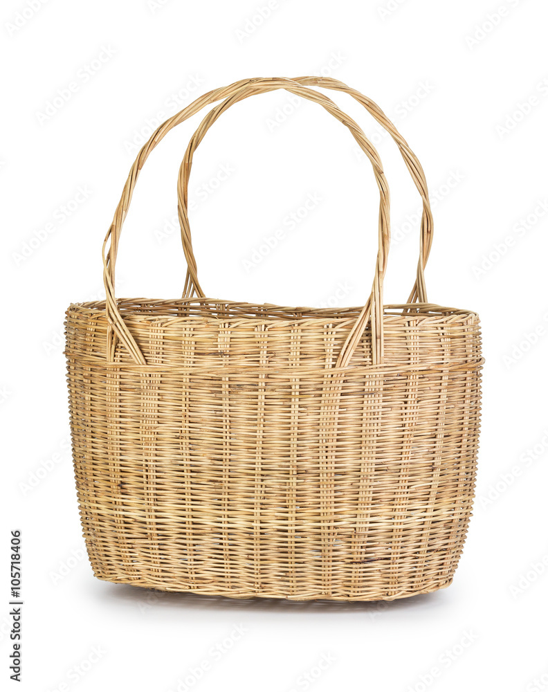 Light brown wicker basket on white