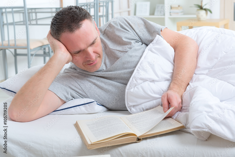 Reading book in bed Reading book in bed