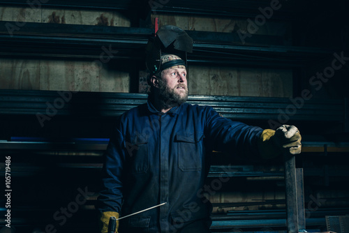 Portrait of welder with beard in workplace © ysbrandcosijn