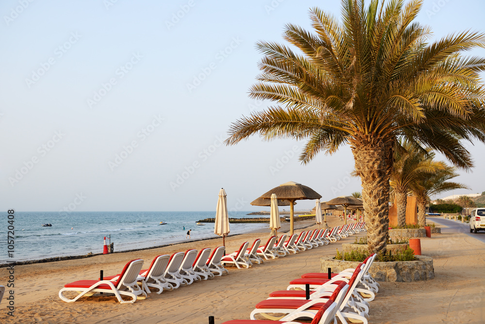 Beach of the luxury hotel during sunset, Ras Al Khaima, UAE