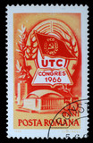 Stamp printed in Romania shows Congress badge and congress building, The fourth congress U.T.C., circa 1966.
