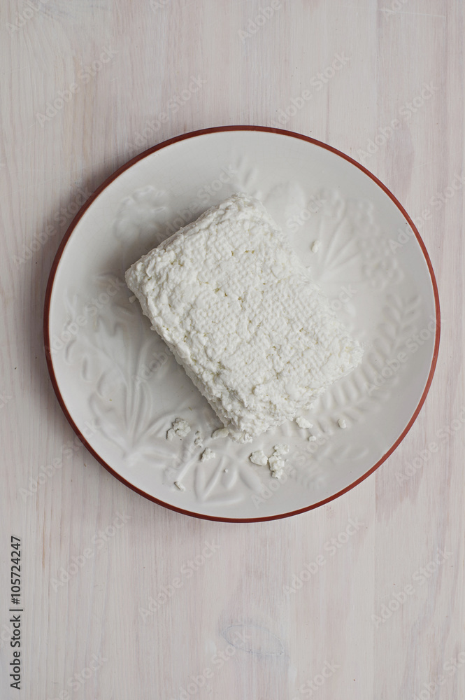 Cottage cheese on round white plate