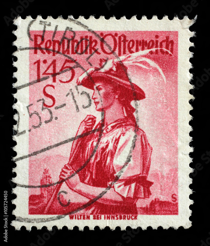 Stamp printed in Austria shows image woman in national Austrian costumes  Wilten  series  circa 1951