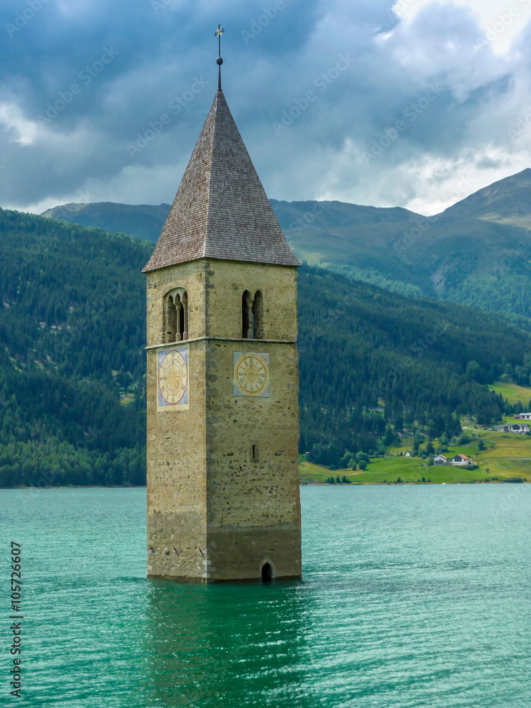 Bell tower of the Church in the Resia lake - 2