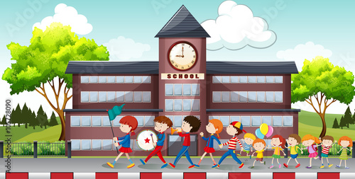 Children marching in front of school