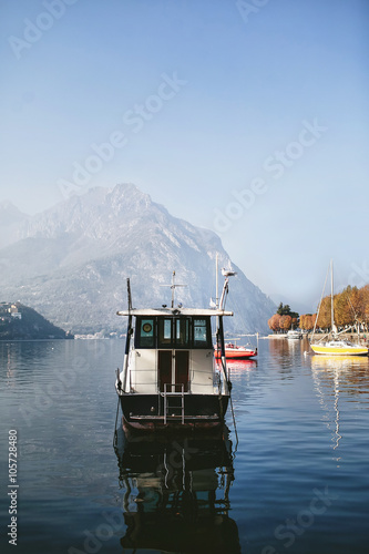 Seagull on boat in a mountain lake Como
