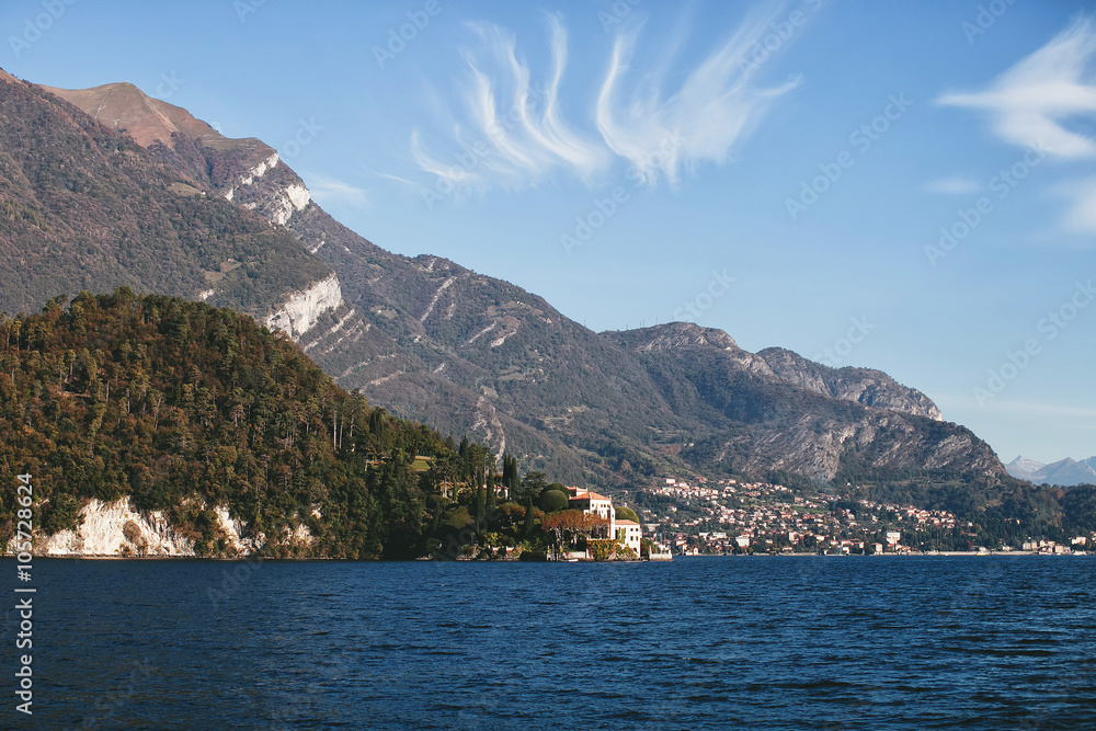 view to the village and mountain of a lake Como