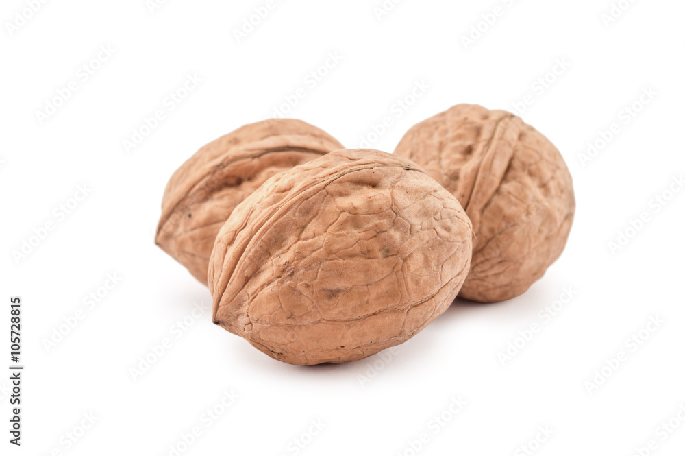 Three walnuts isolated on white Three walnuts isolated on white