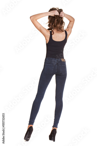 Portrait of a beautiful woman in blue jeans and blue shirt