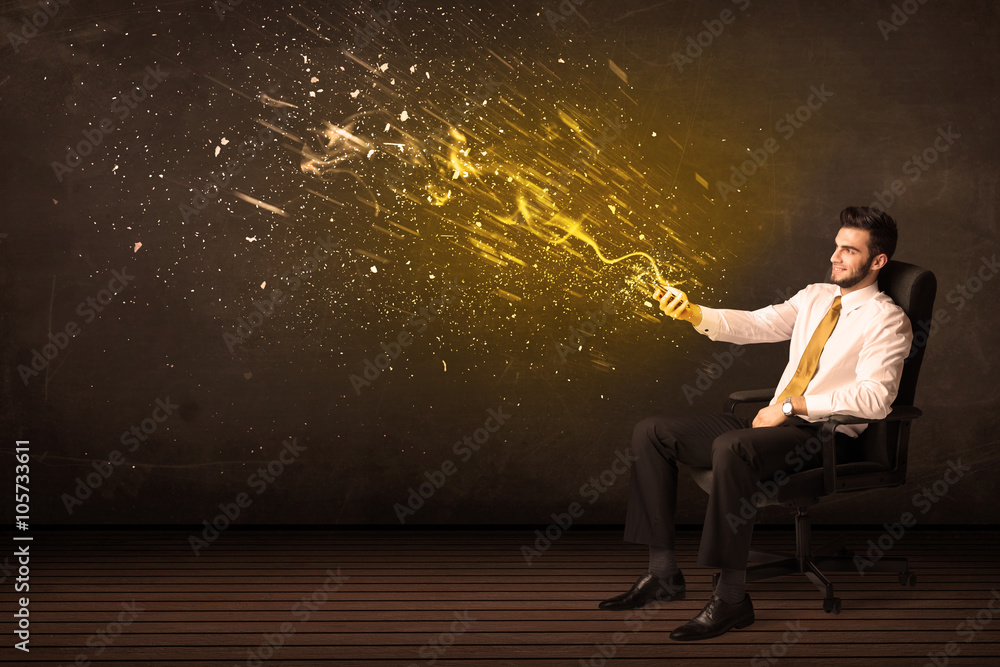 Businessman with tablet and energy explosion on background Businessman with tablet and energy explosion on background