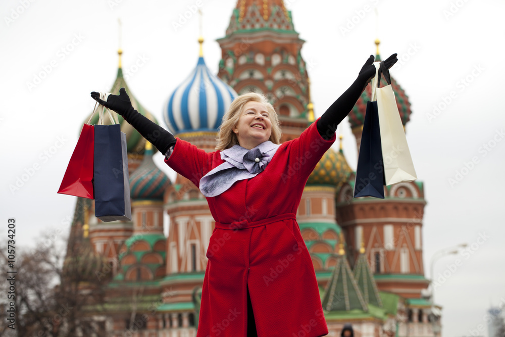Mature happy woman with shopping bags Mature happy woman with shopping bags