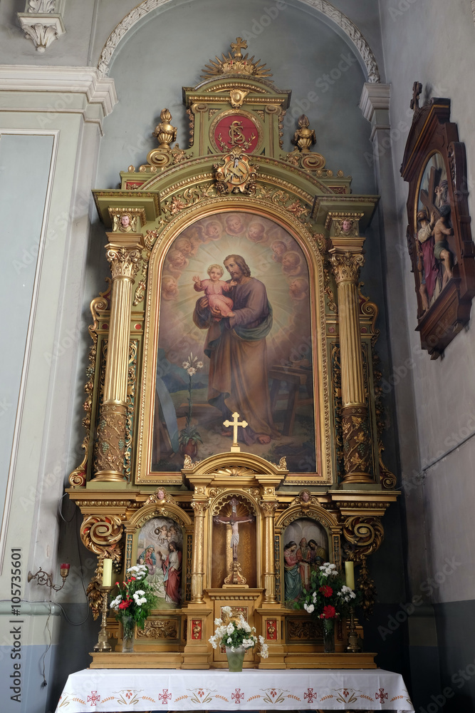 Saint Joseph holding child Jesus altarpiece in the Basilica of the Sacred Heart of Jesus in Zagreb, Croatia 