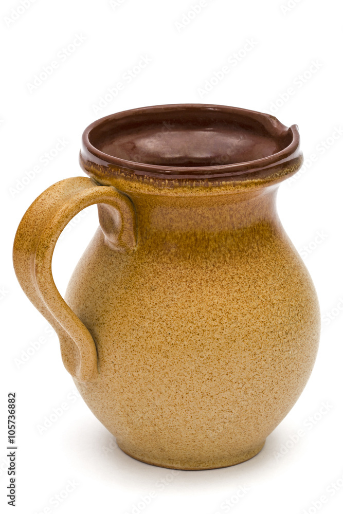 Old pitcher, isolated on white background